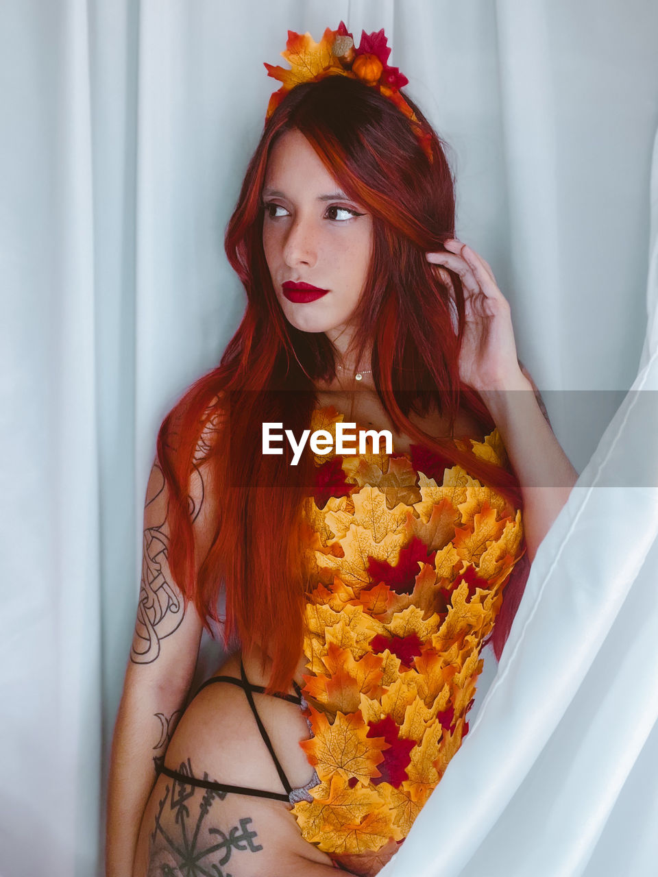 women, redhead, one person, adult, young adult, portrait, fashion, long hair, hairstyle, dyed red hair, clothing, looking at camera, flower, indoors, dress, costume, wedding dress, bride, lifestyles, flowering plant, orange, red, female, elegance, beauty in nature, person, yellow, waist up, nature, looking, emotion, photo shoot, smiling