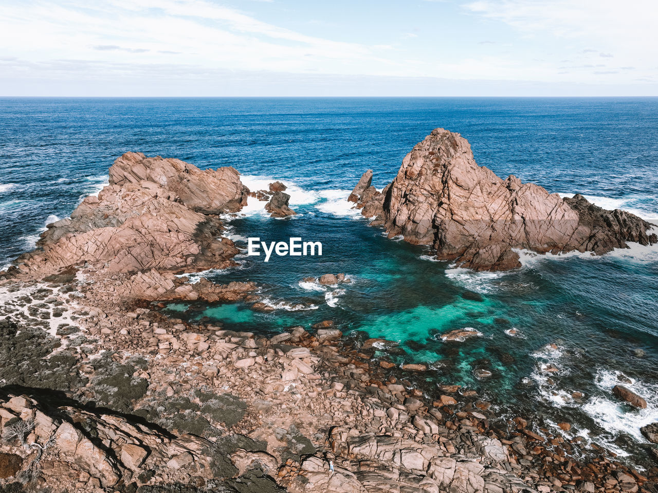 scenic view of sea against blue sky