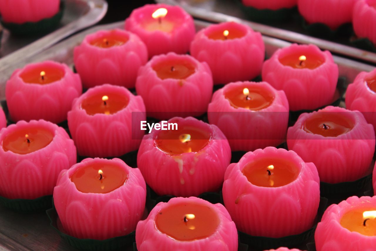 High angle view of pink candles