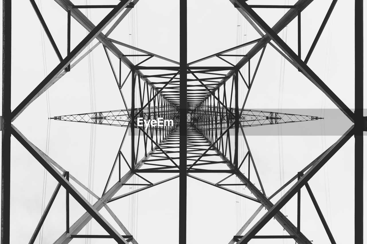 LOW ANGLE VIEW OF ELECTRICITY PYLON