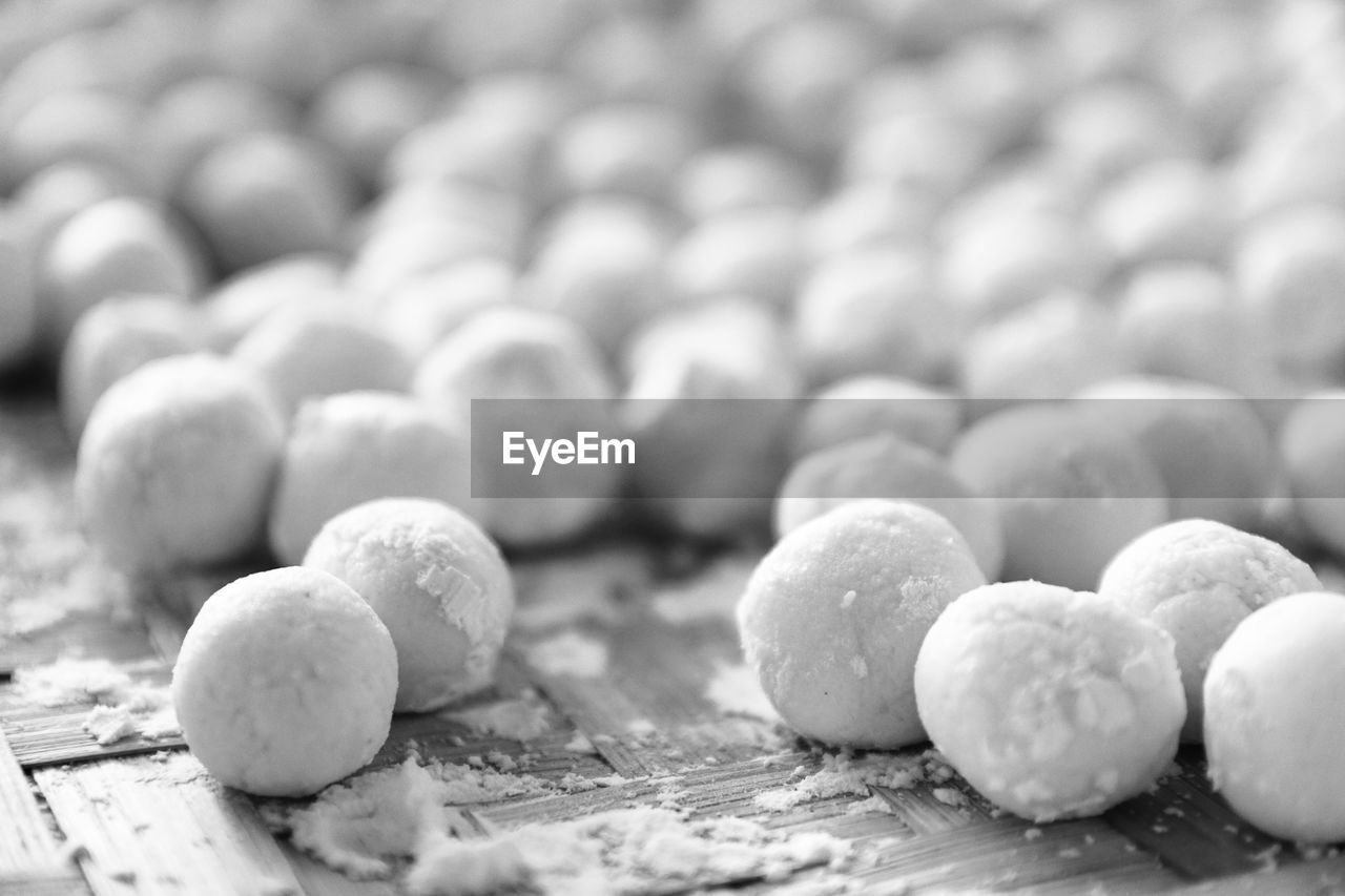 CLOSE-UP OF PEBBLE ON TABLE