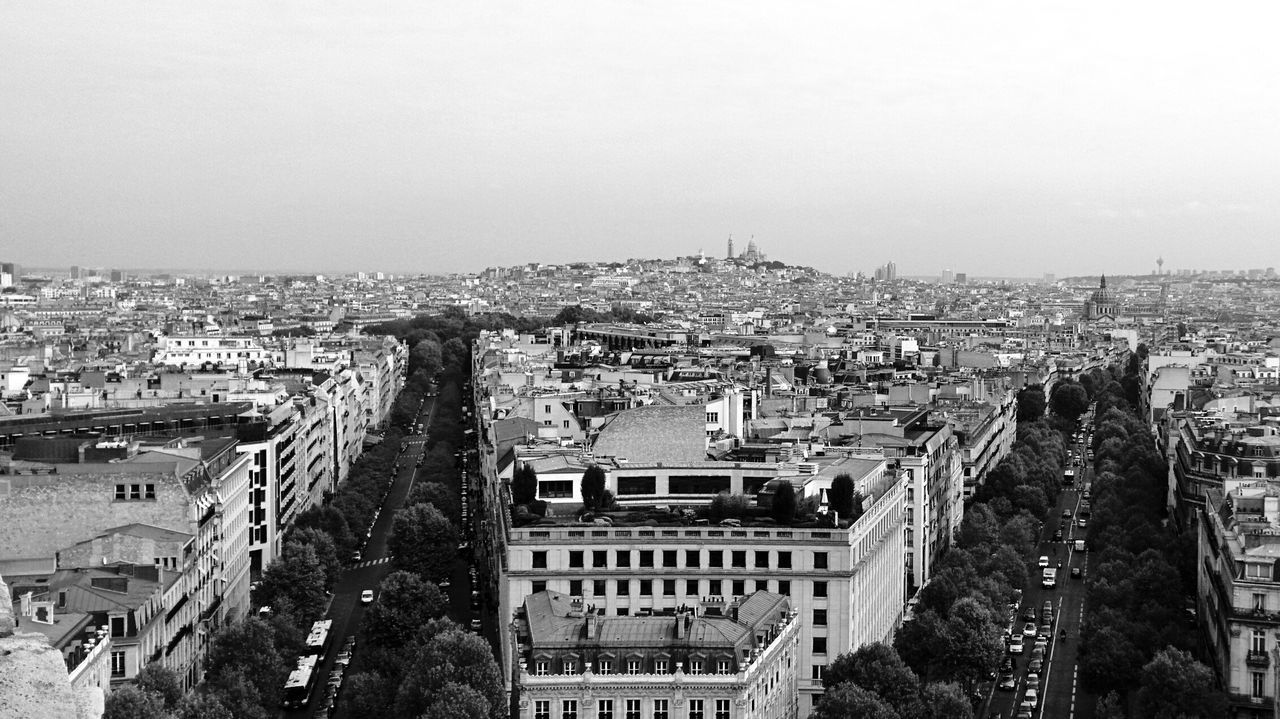 Buildings in city against sky