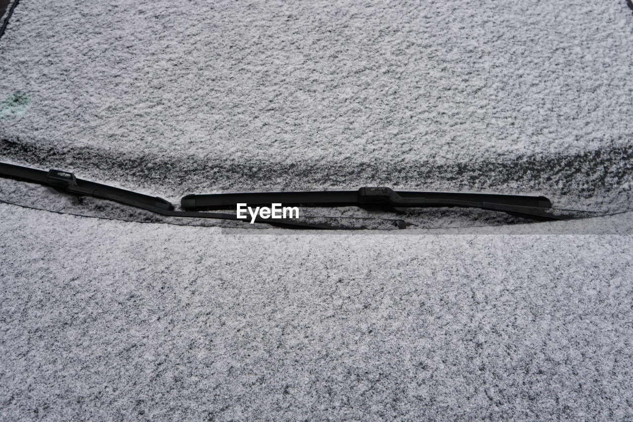 High angle view of snow on a car