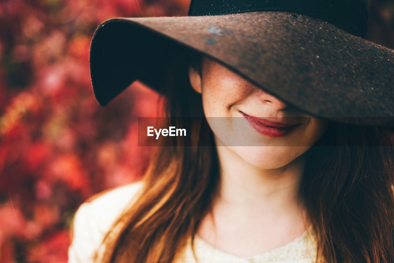 portrait of woman wearing hat