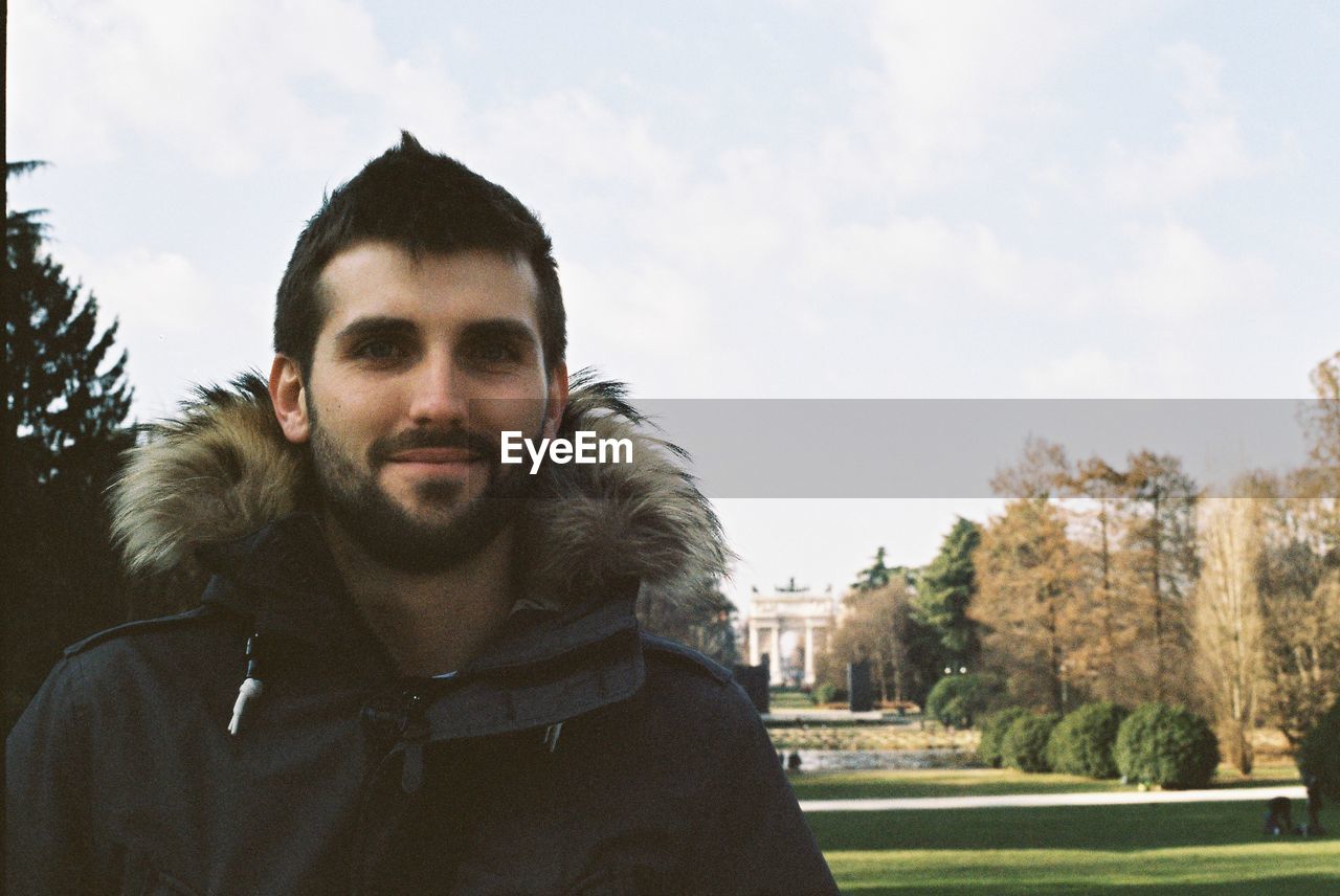 Portrait of smiling man against the sky