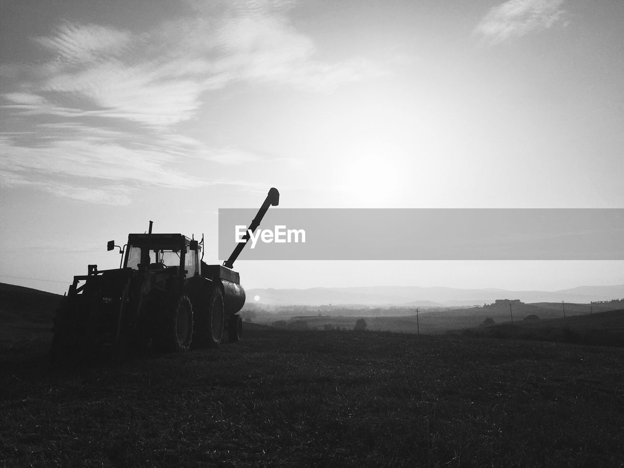 Agricultural machinery on landscape