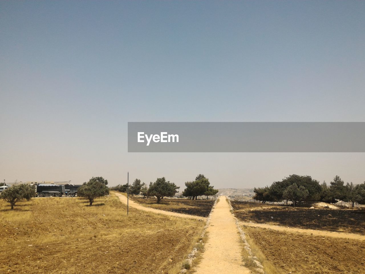 Empty road along landscape