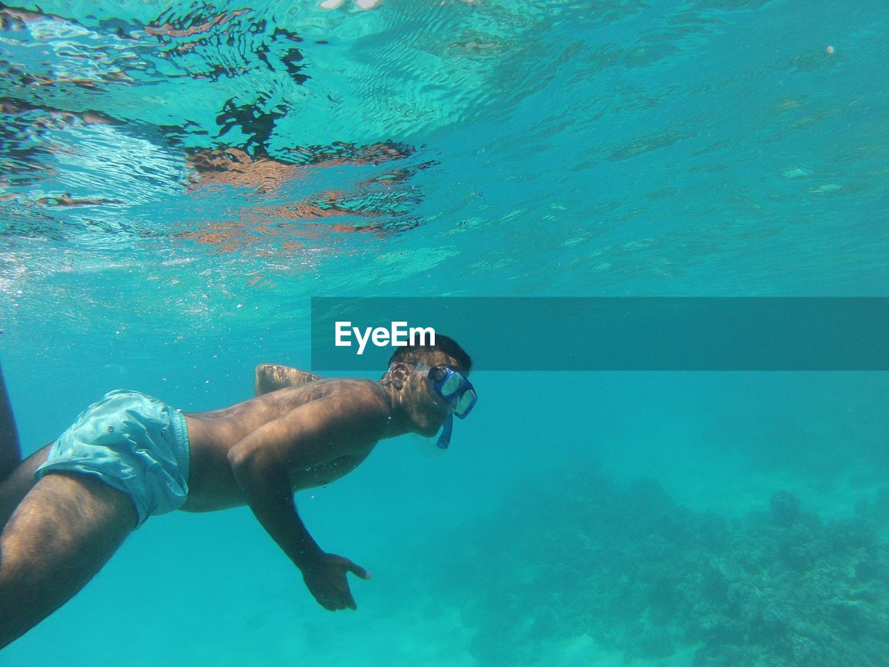 Man swimming in sea