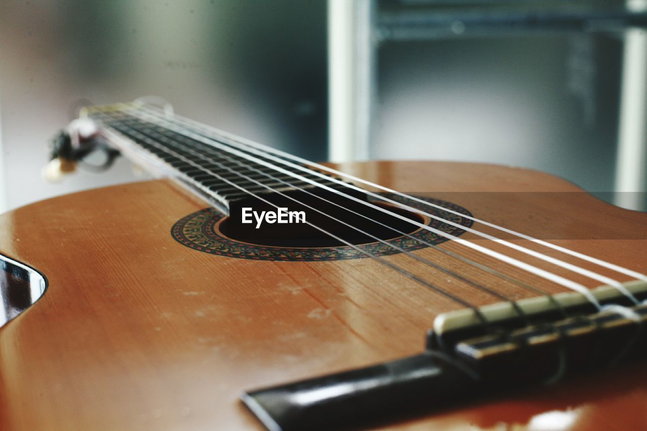 Close-up of guitar at home