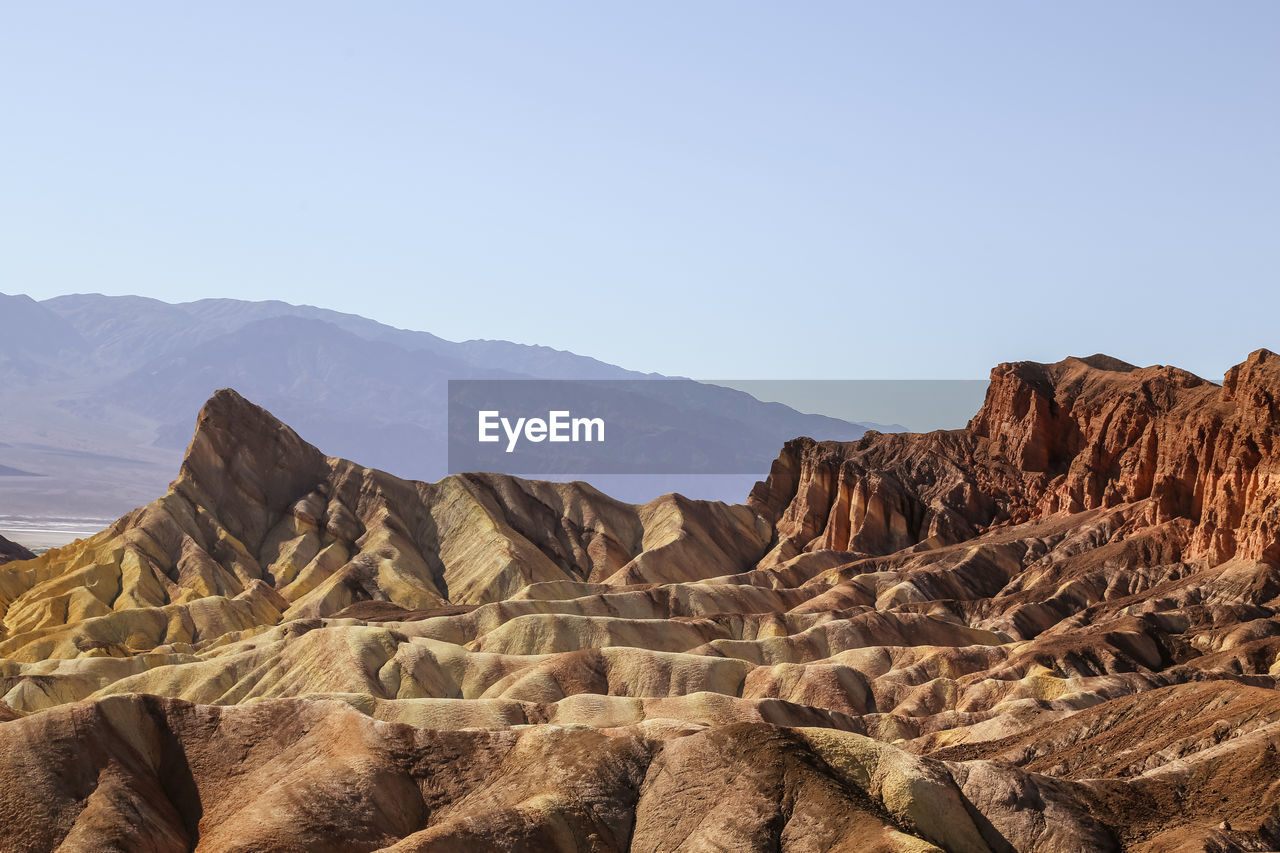 Scenic view of mountains against clear sky