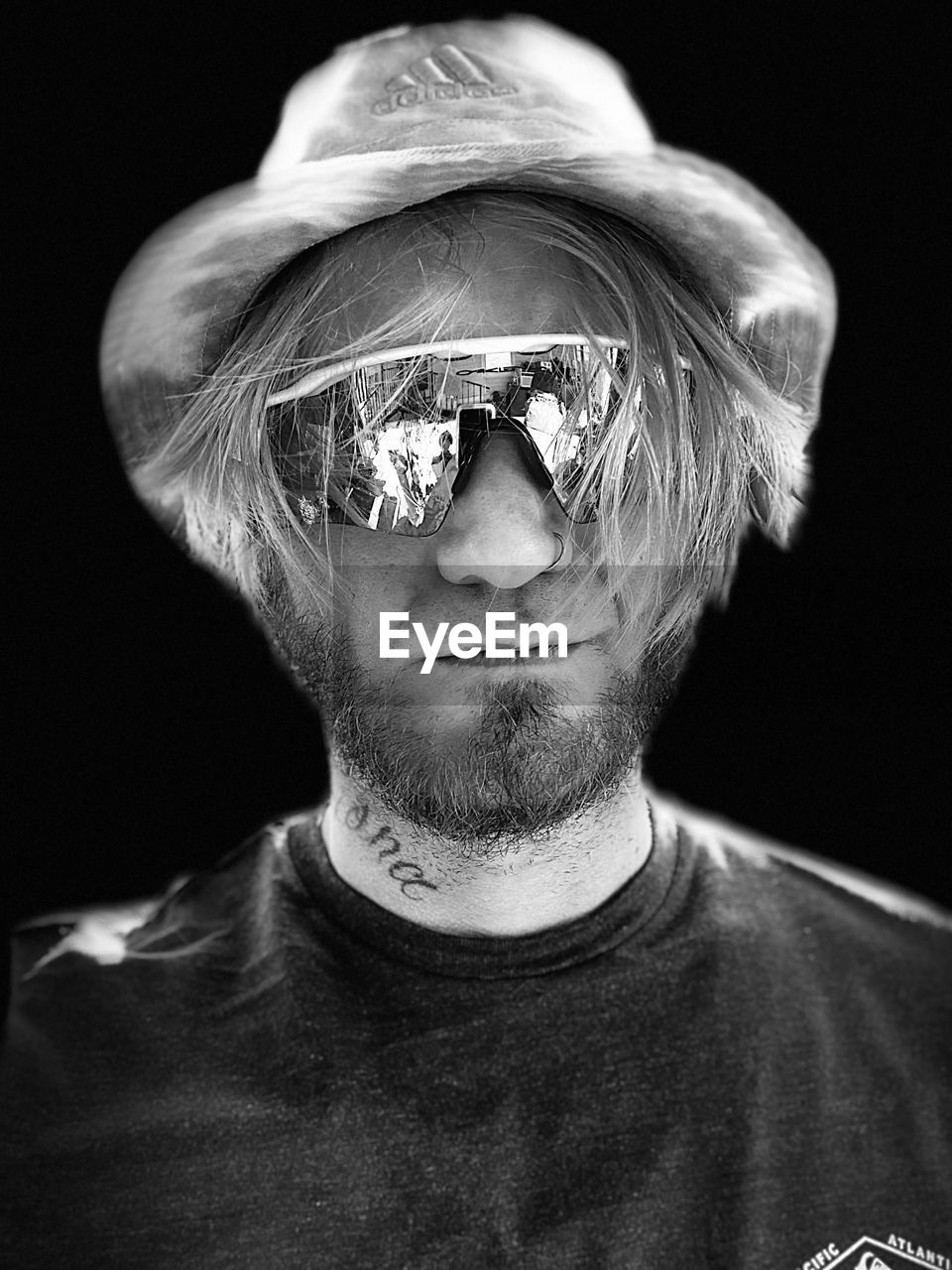 black, portrait, one person, headshot, black background, white, black and white, studio shot, monochrome, monochrome photography, adult, front view, indoors, close-up, men, clothing, looking at camera, human face, human head, darkness, sculpture, glasses, young adult