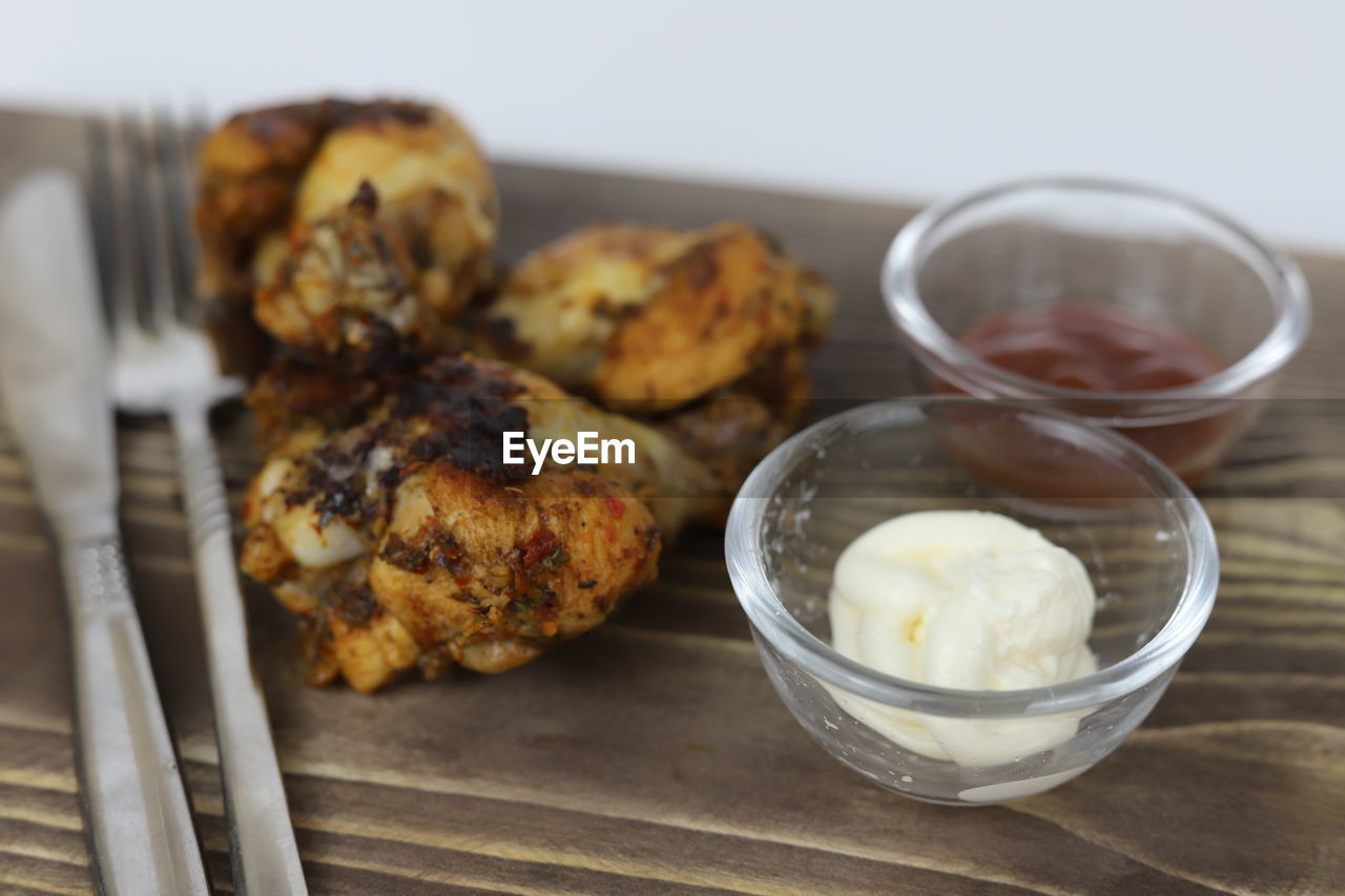 food and drink, food, dish, dessert, breakfast, freshness, produce, healthy eating, meal, baked, indoors, no people, wellbeing, fried food, studio shot, close-up, focus on foreground, wood, table, cuisine, bowl, vegetable, snack, meat, household equipment