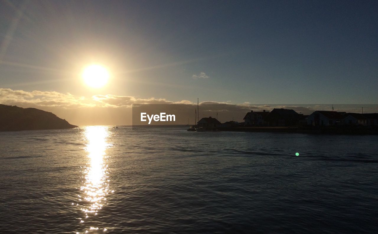 VIEW OF SEA AGAINST SKY DURING SUNSET