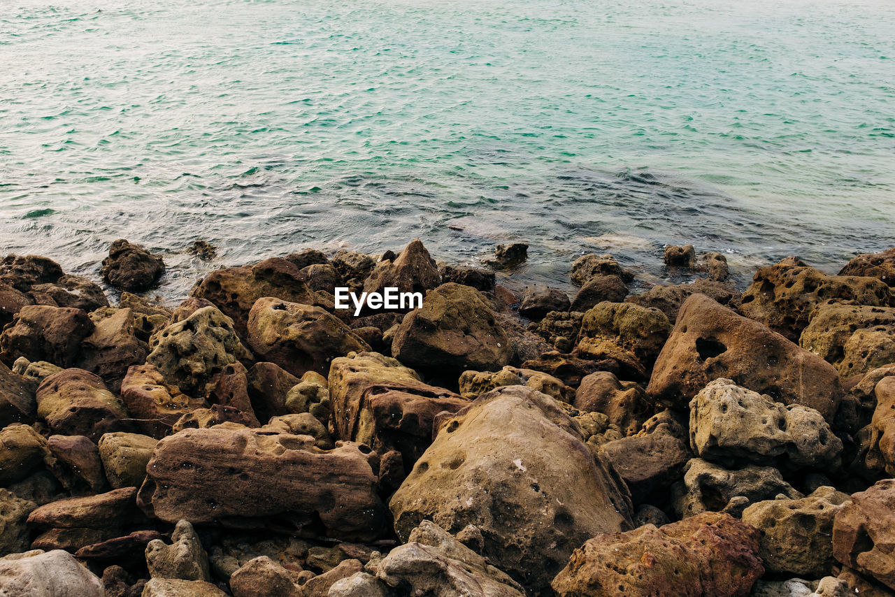 High angle view of rocks on beach