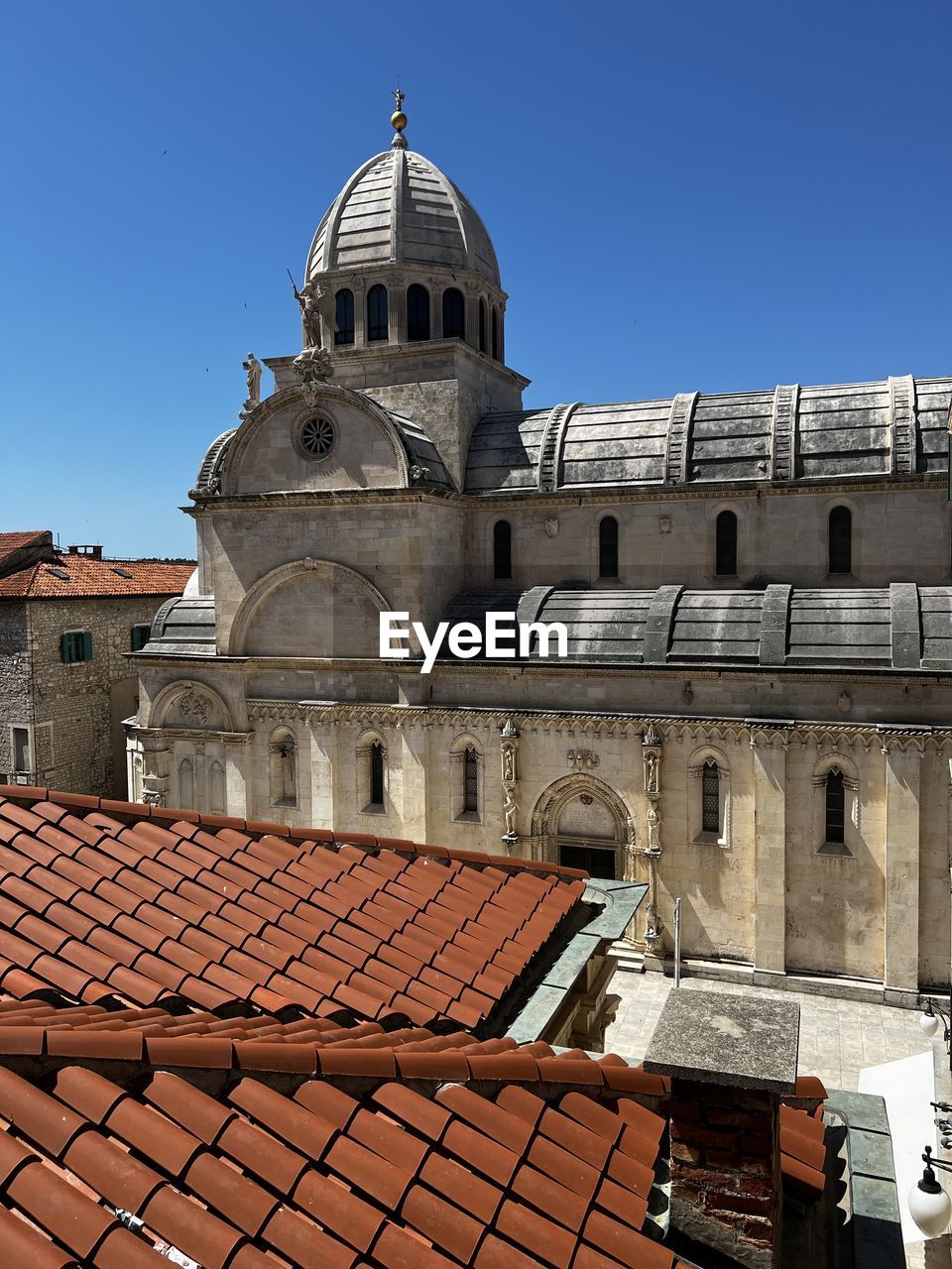 Low angle view of buildings against clear sky