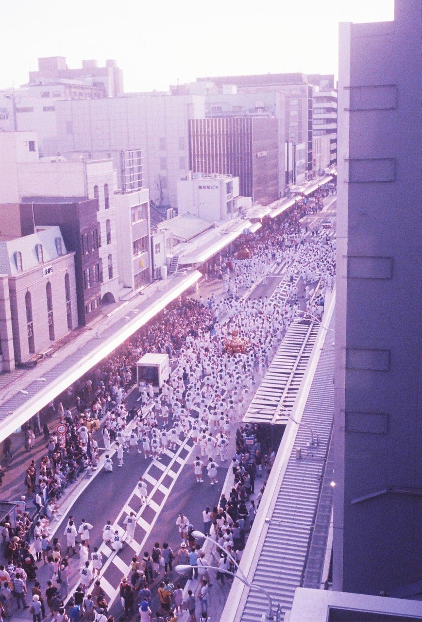 HIGH ANGLE VIEW OF CITY STREET AND BUILDINGS