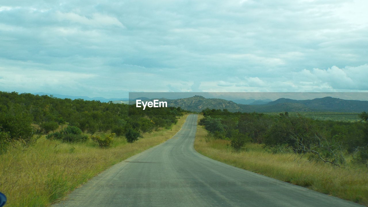 EMPTY ROAD ALONG LANDSCAPE