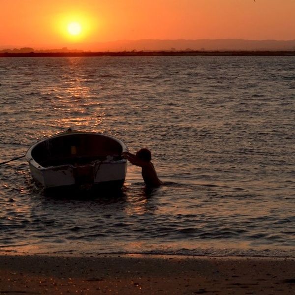 SUNSET OVER CALM SEA