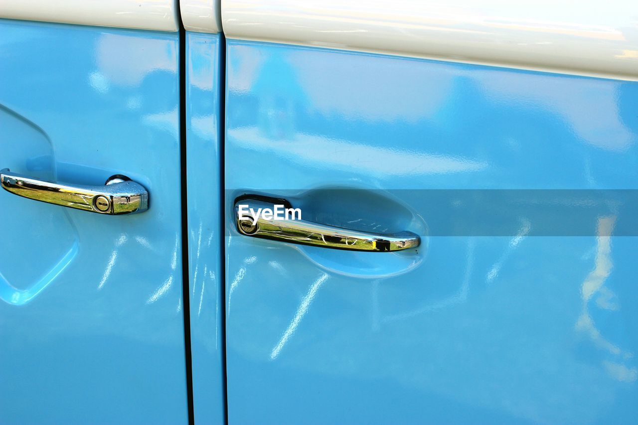 Close-up of vintage car doors