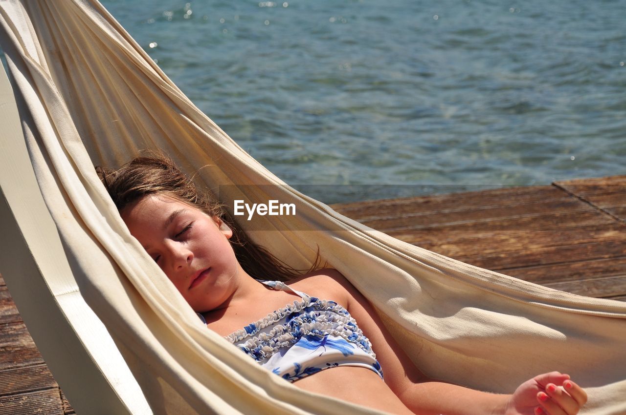 Girl sleeping in hammock