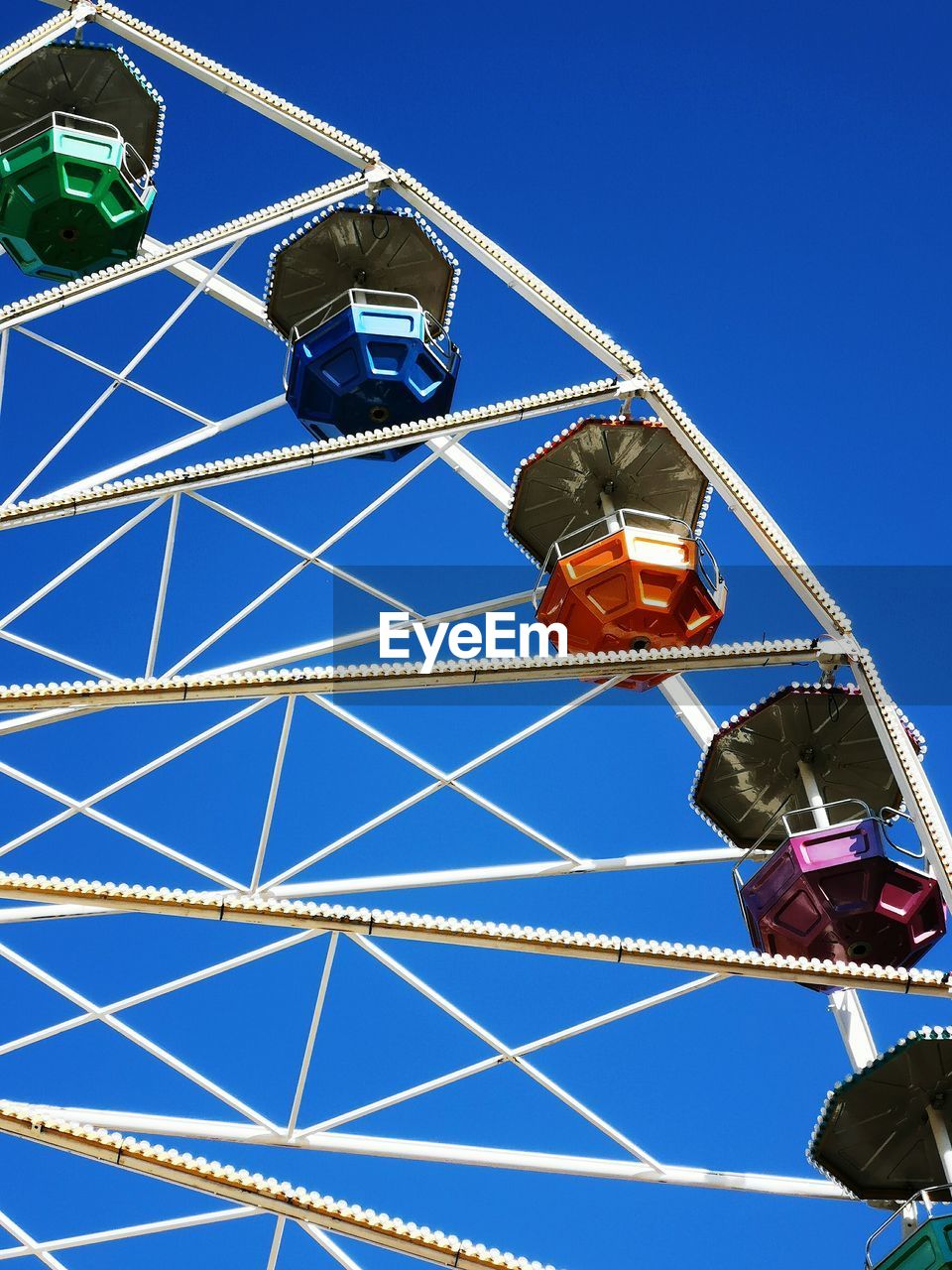 LOW ANGLE VIEW OF FERRIS WHEEL AGAINST SKY