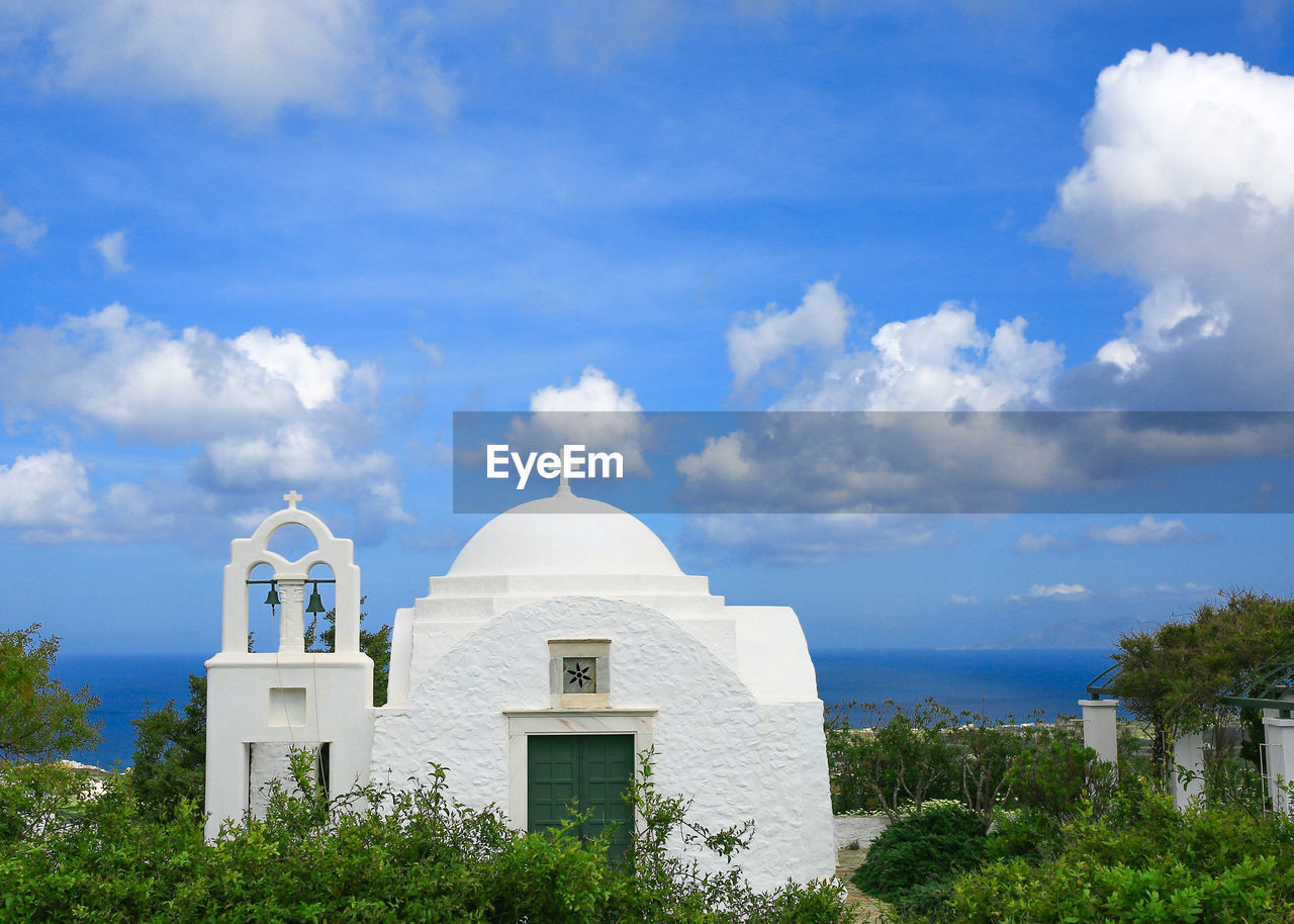 VIEW OF WHITE BUILDING AGAINST SKY