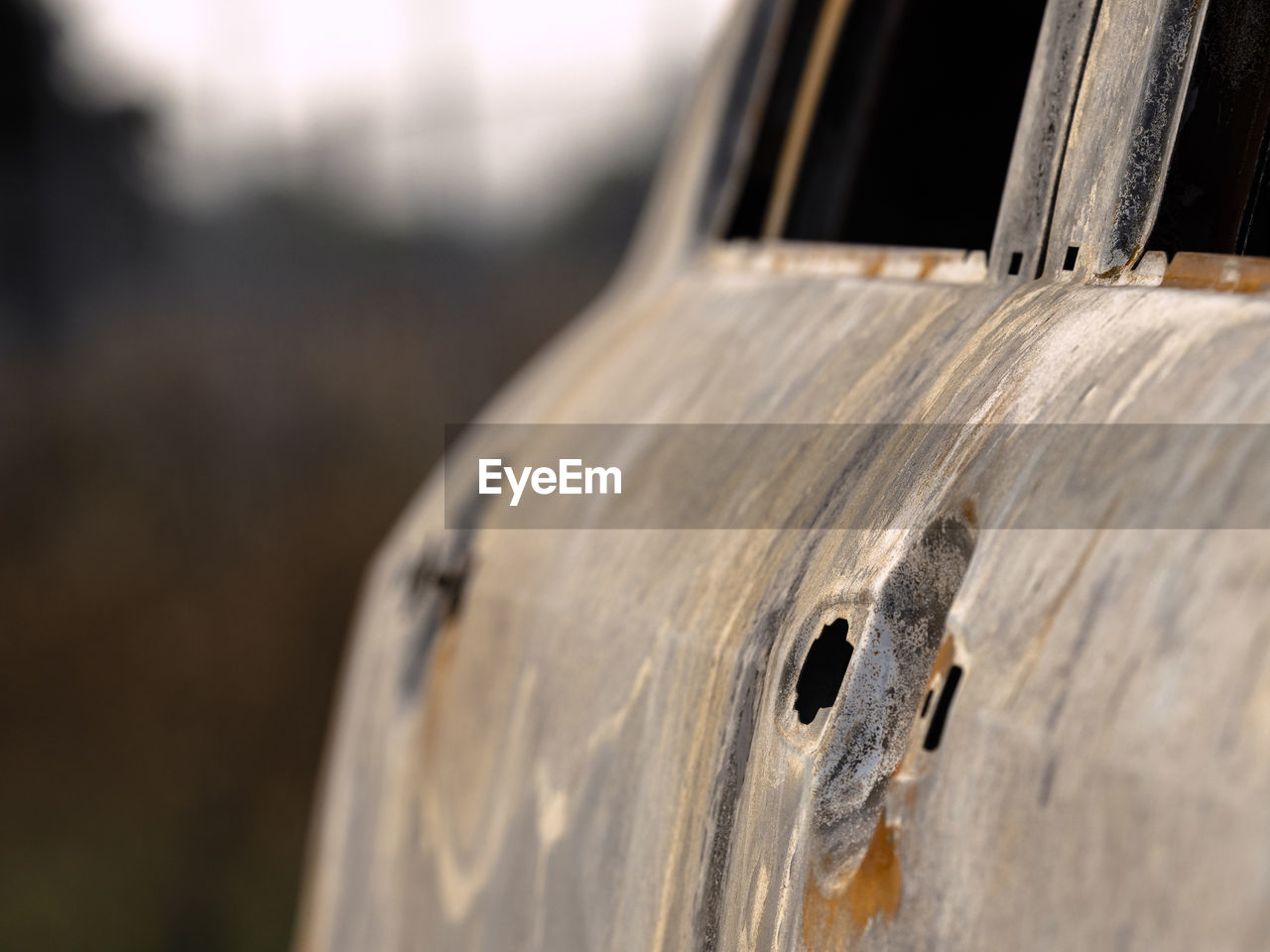 Close-up of old rusty car