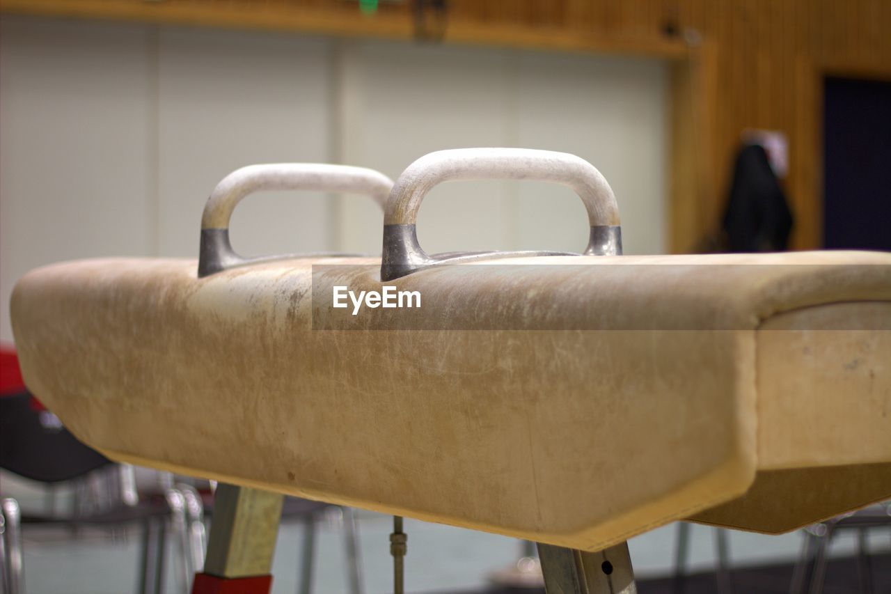 Close-up of pommel horse at gym