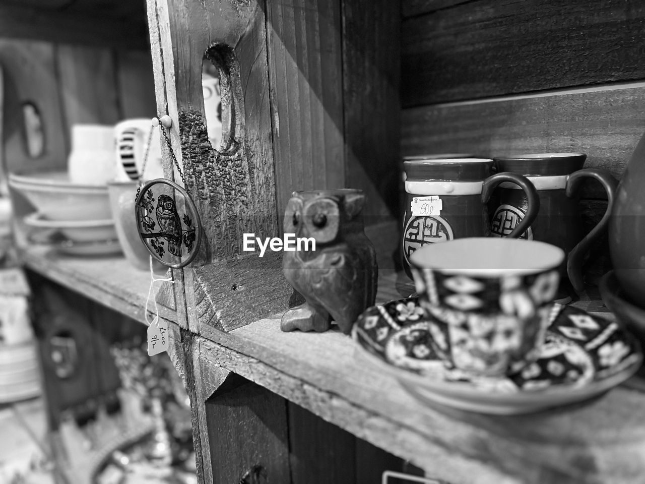 black and white, black, monochrome, monochrome photography, white, no people, cup, mug, indoors, food and drink, tableware, crockery, wood, coffee cup, drink, still life, saucer