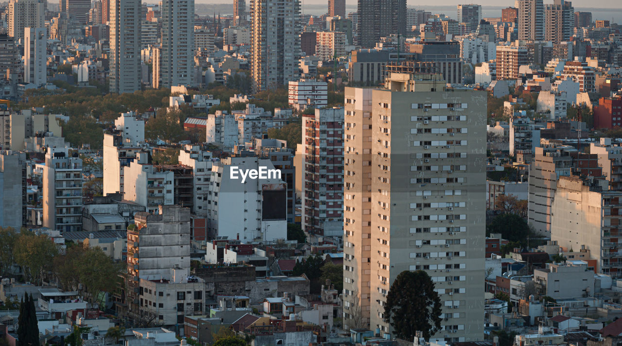 HIGH ANGLE VIEW OF BUILDINGS AND CITY