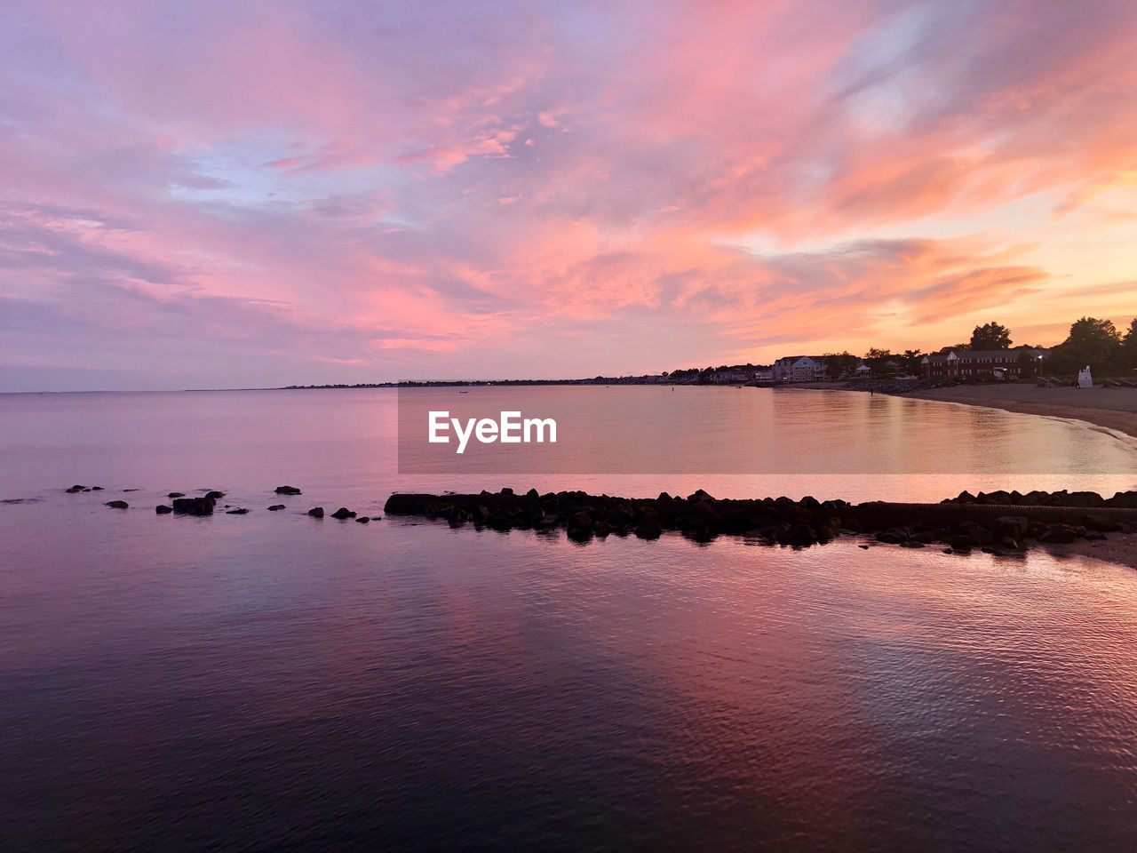 water, sky, sunset, sea, beauty in nature, reflection, scenics - nature, cloud, nature, dawn, tranquility, landscape, environment, land, tranquil scene, horizon, afterglow, beach, evening, sun, travel destinations, no people, dramatic sky, seascape, travel, outdoors, idyllic, horizon over water, twilight, shore, coast, romantic sky, sunlight, bay, pink, orange color, lagoon, relaxation, summer, architecture, tourism