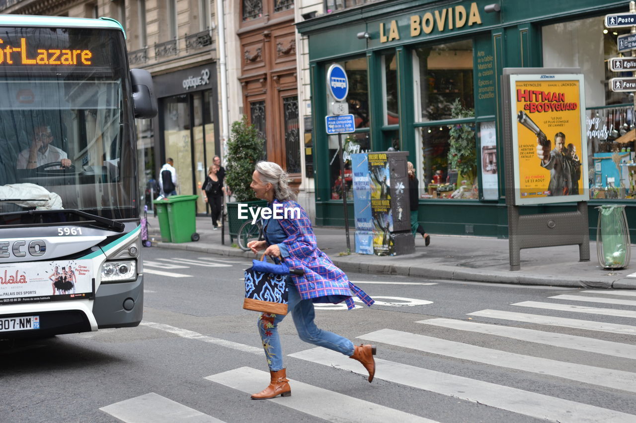 WOMAN WALKING ON STREET