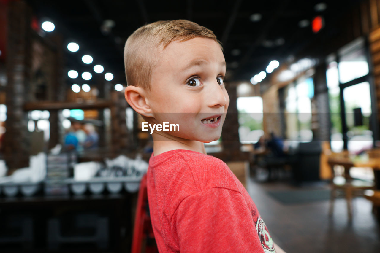 Portrait of smiling boy at restaurant