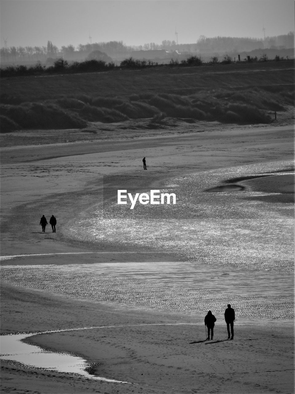 High angle view of silhouette people at beach