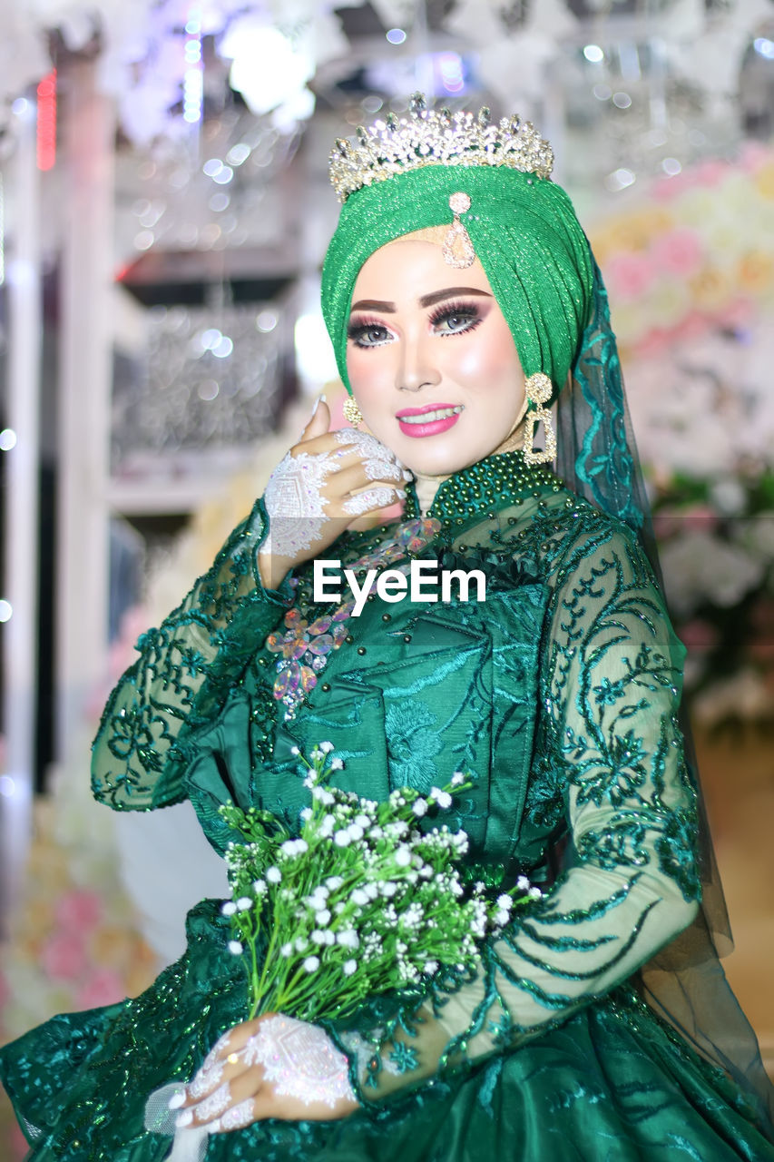 Portrait of smiling bride during wedding ceremony