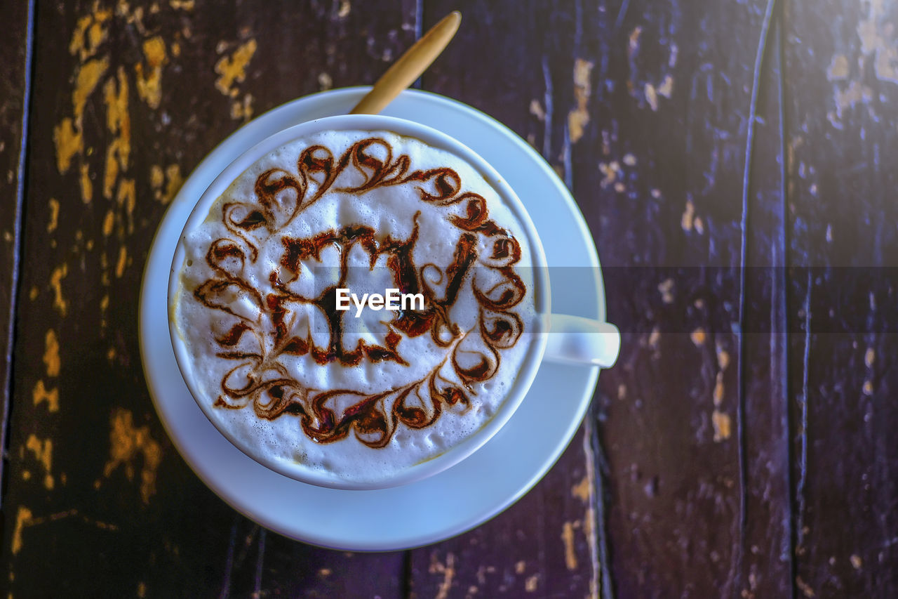 Directly above shot of cappuccino on table