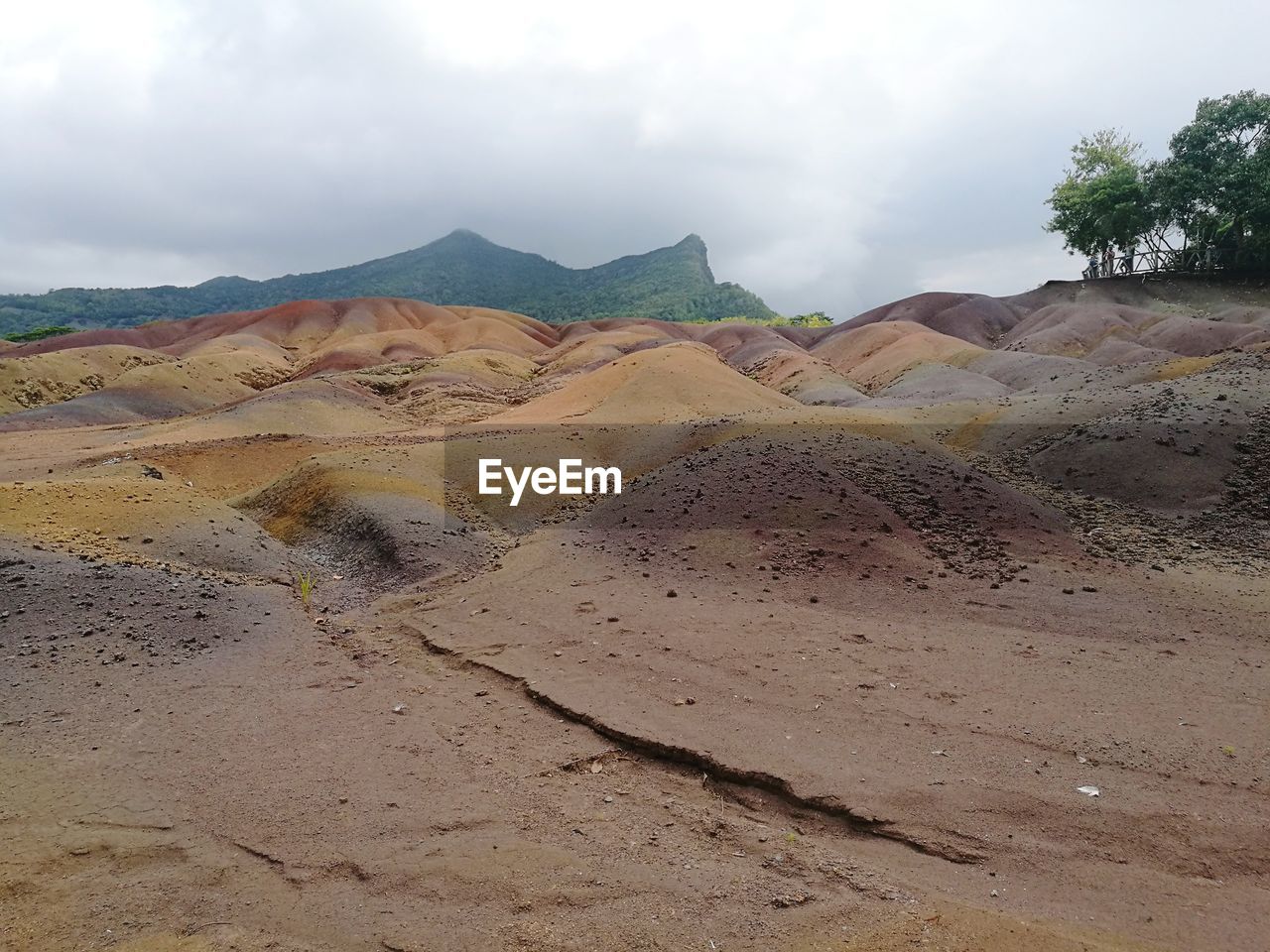 Scenic view of seven coloured earth at chamarel against sky