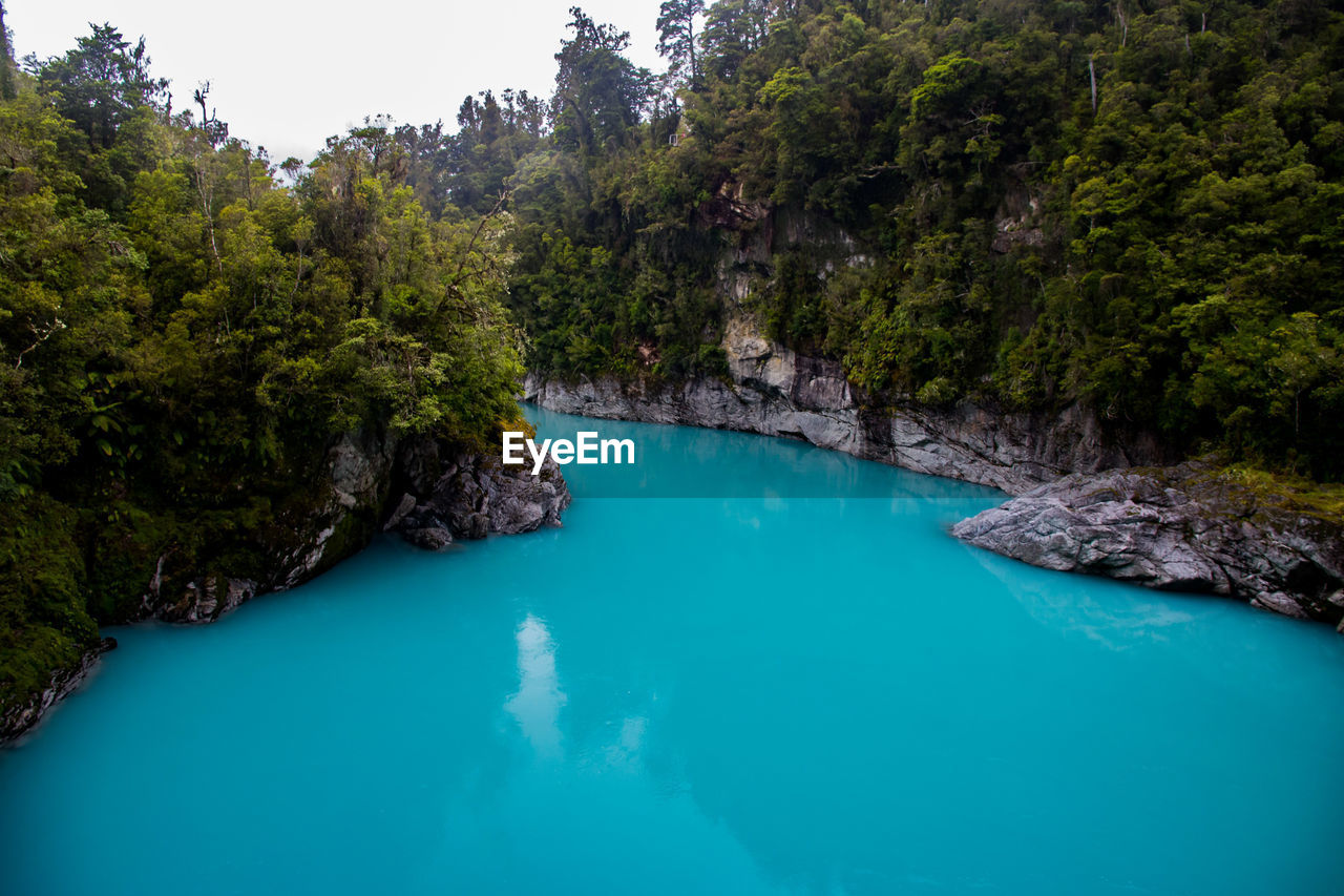 The beautiful blue glacial river in hokitika gorge