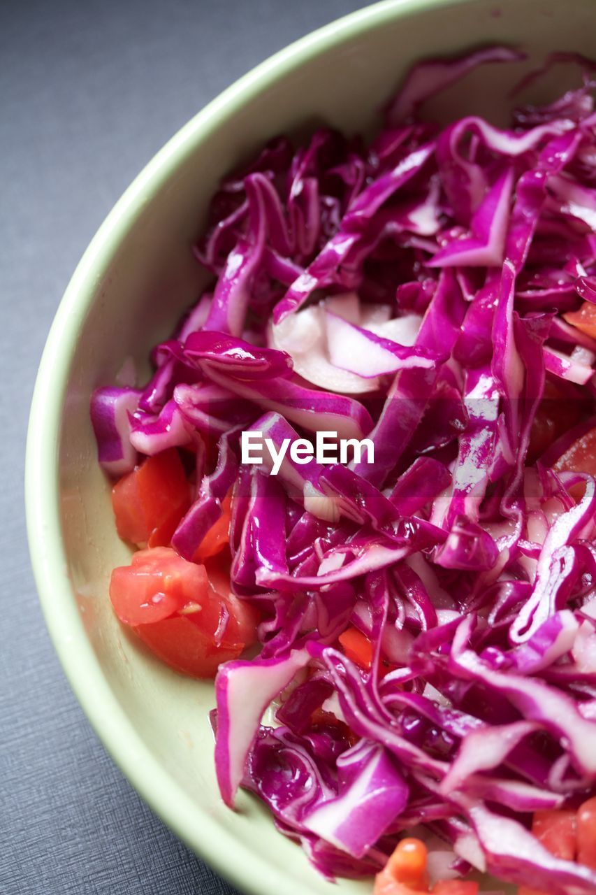 food and drink, food, healthy eating, wellbeing, vegetable, freshness, produce, bowl, indoors, purple, studio shot, salad, no people, red onion, dish, organic, spanish onion, petal, chopped, onion, plant, close-up, cabbage, vegetarian food, fruit, high angle view, raw food, red