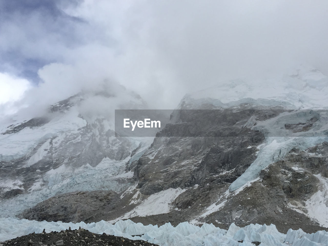 Scenic view of mountains against sky during winter
