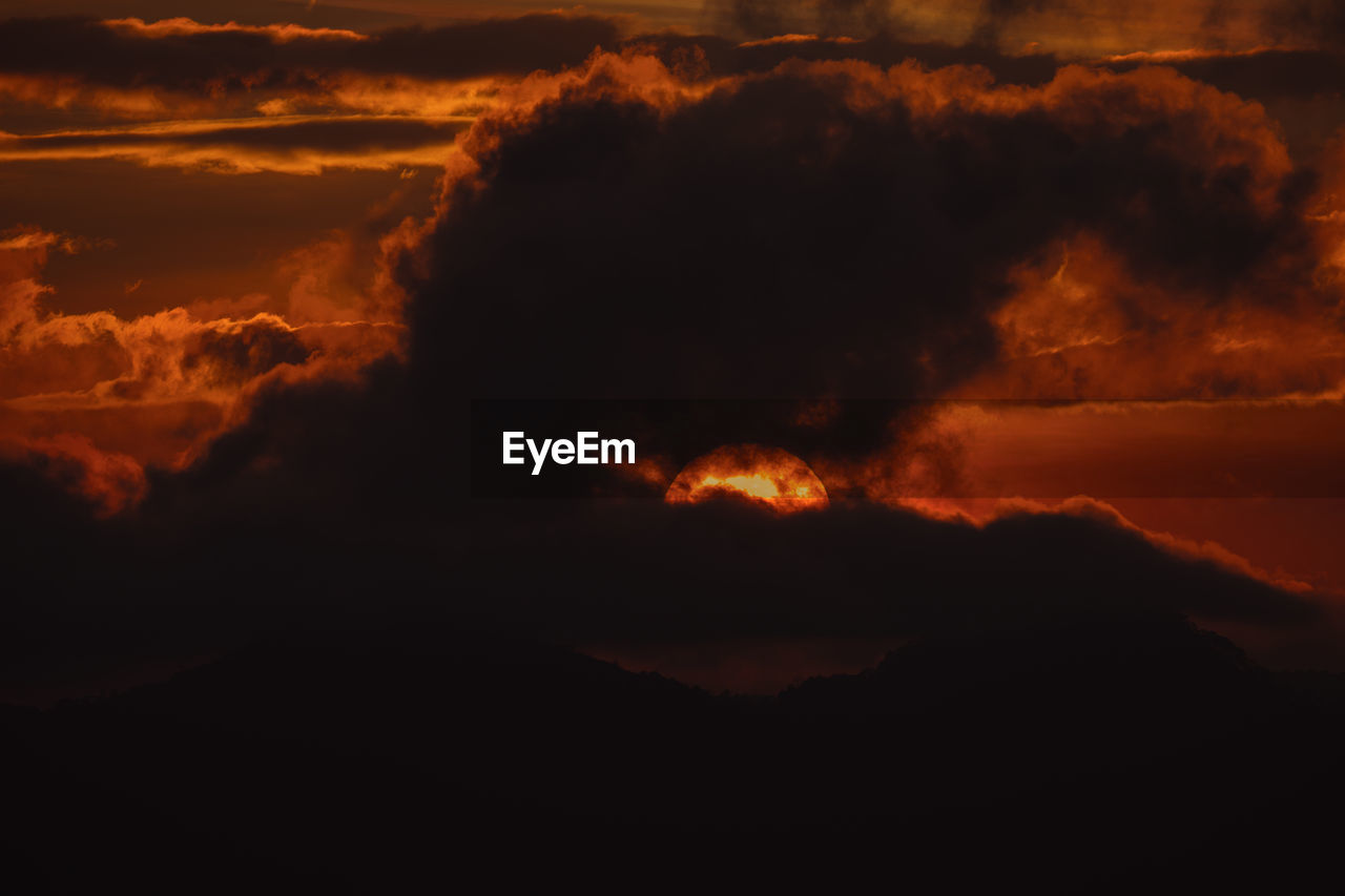 cloud, sky, sunset, beauty in nature, nature, environment, no people, orange color, mountain, dawn, heat, burning, warning sign, night, afterglow, land, scenics - nature, geology, lava, outdoors, power in nature, fire, sign, landscape, volcano, red sky at morning, smoke, accidents and disasters, evening, communication, erupting