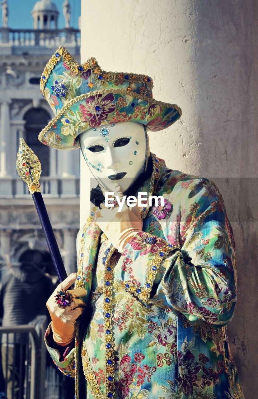 Man in carnival costume and mask during venice carnival