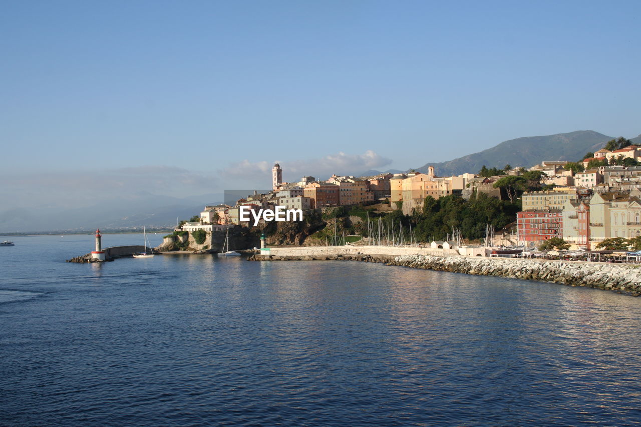 Sea by bastia against blue sky