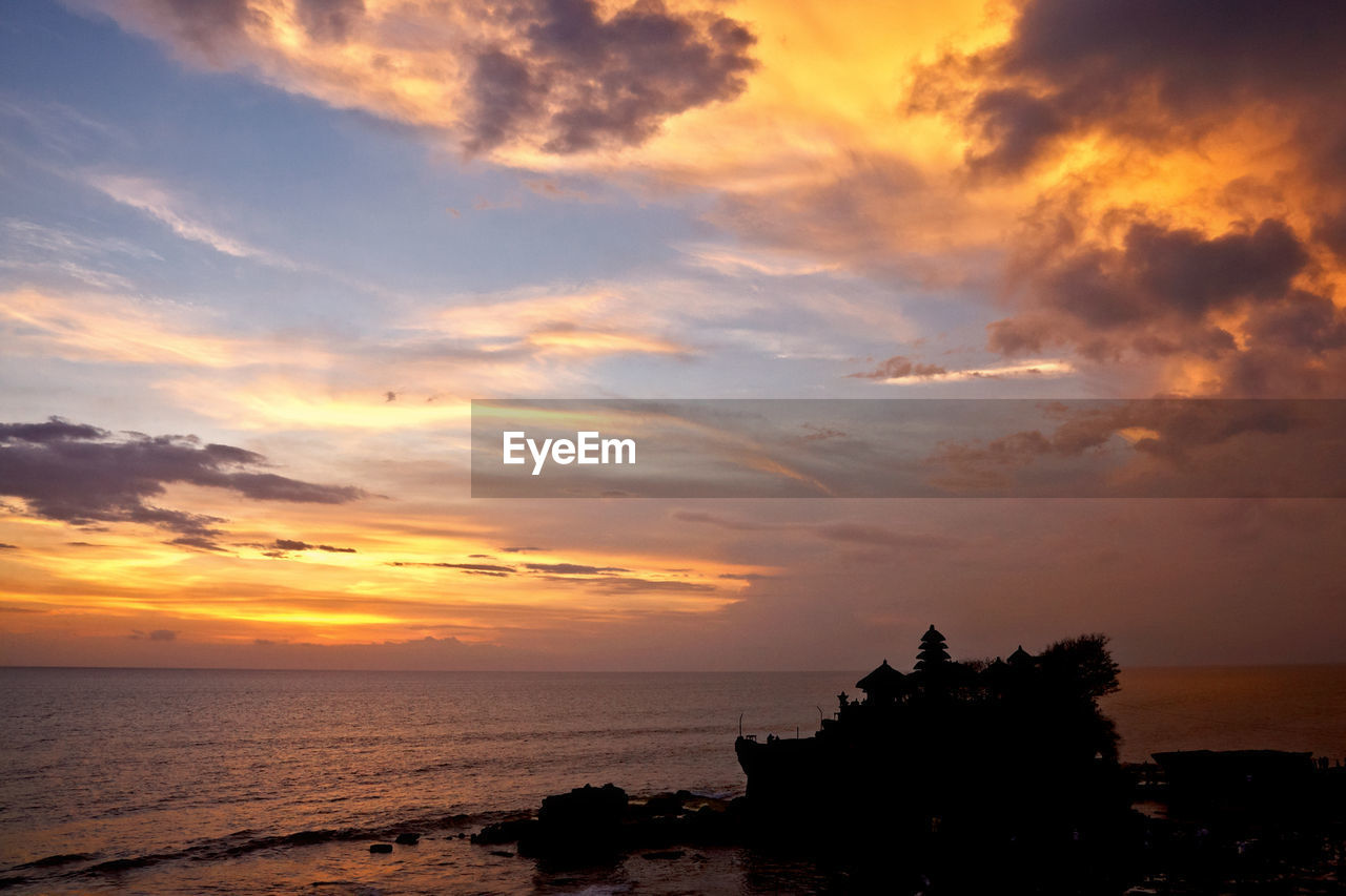 SCENIC VIEW OF SEA DURING SUNSET