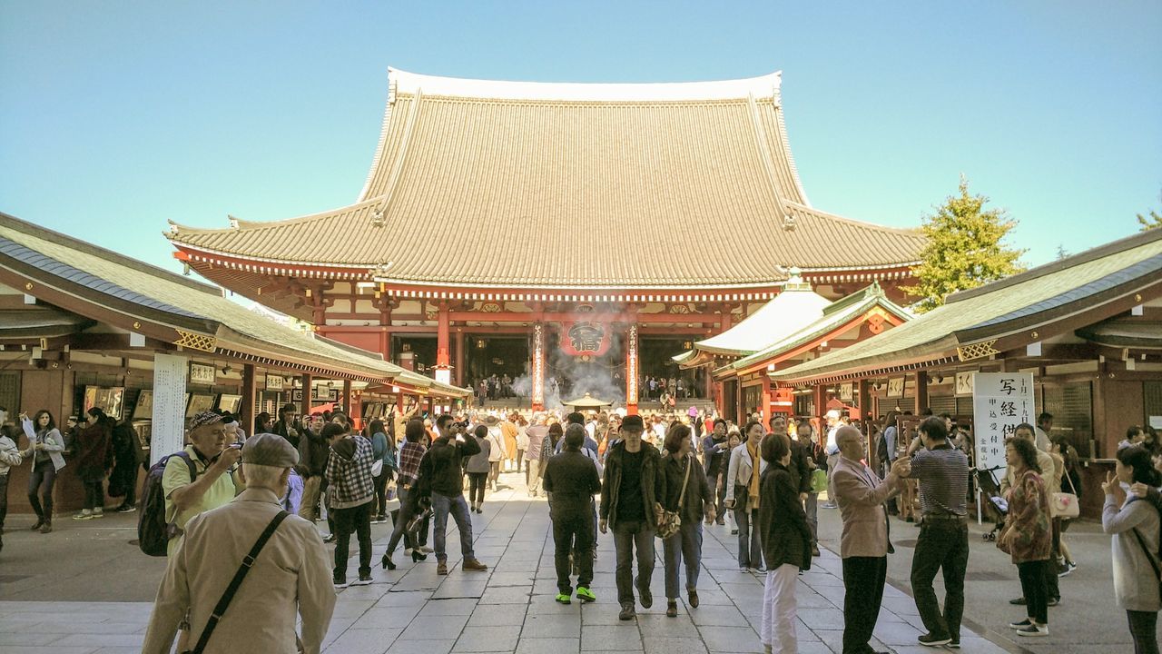 People outside temple