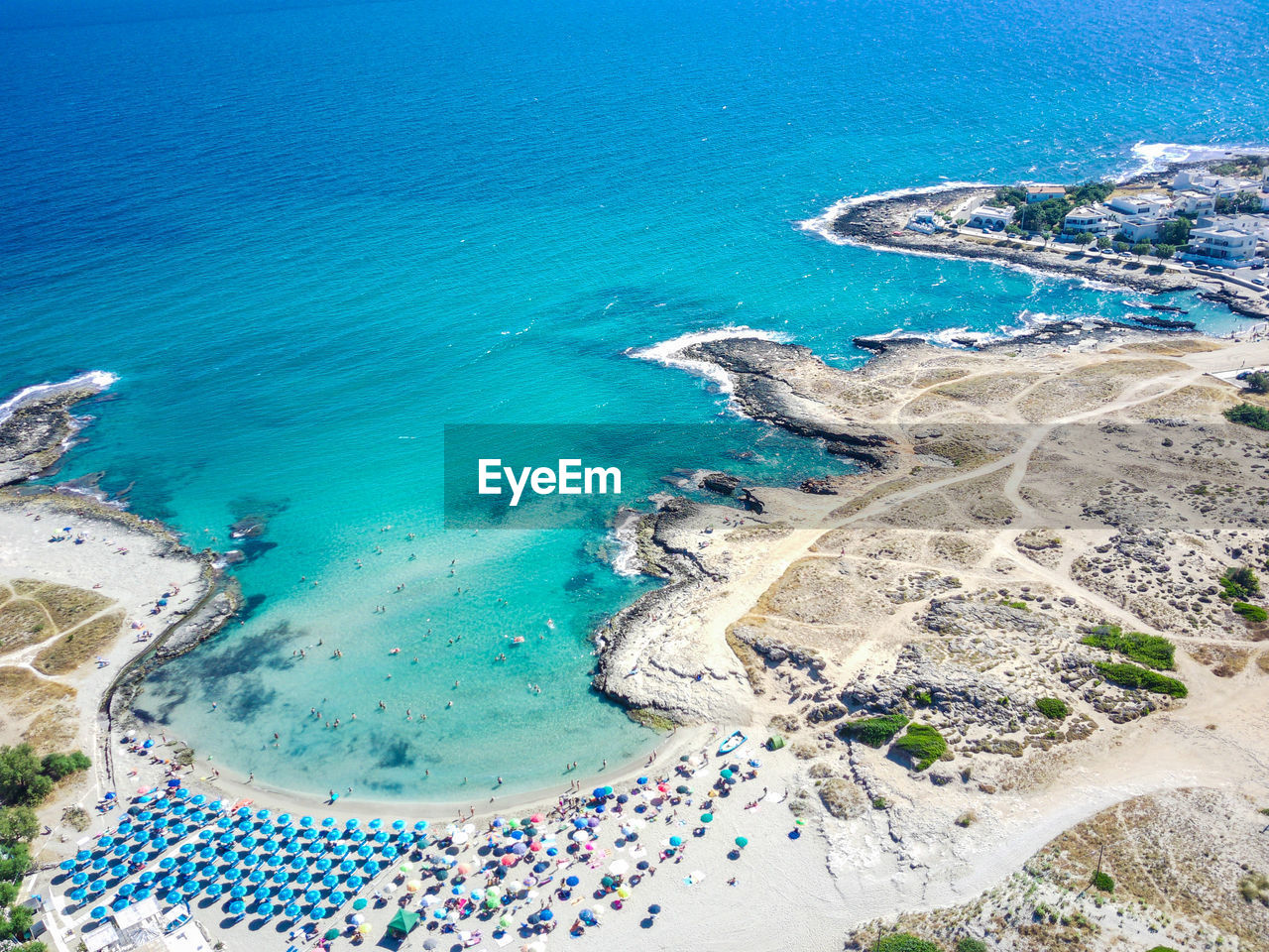 HIGH ANGLE VIEW OF SURF ON BEACH