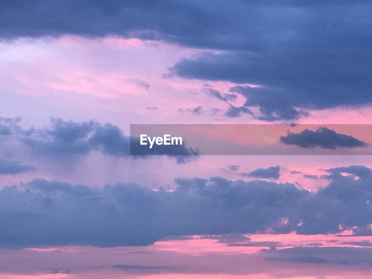 Low angle view of dramatic sky during sunset