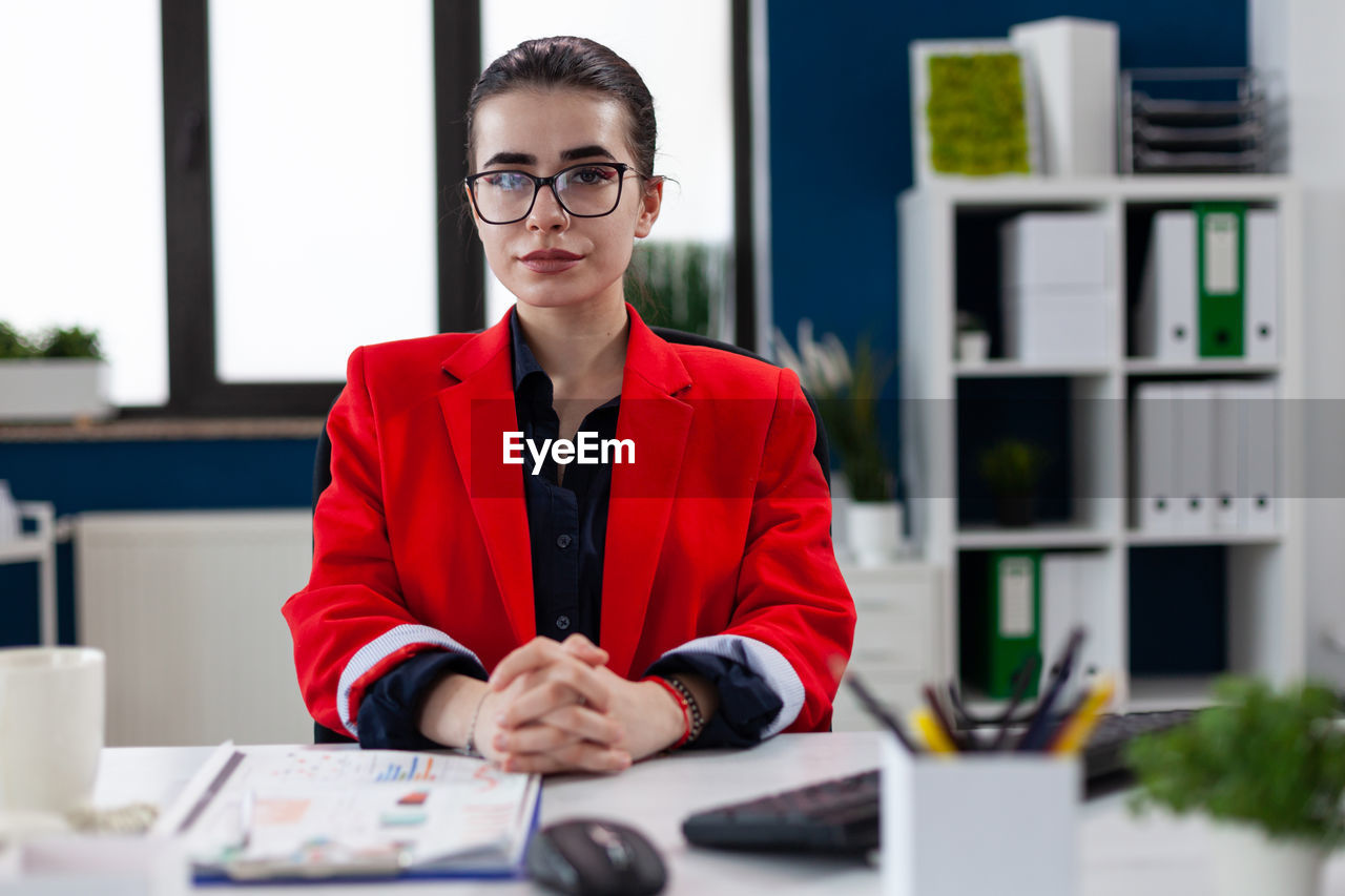 Portrait of businesswoman sitting at office
