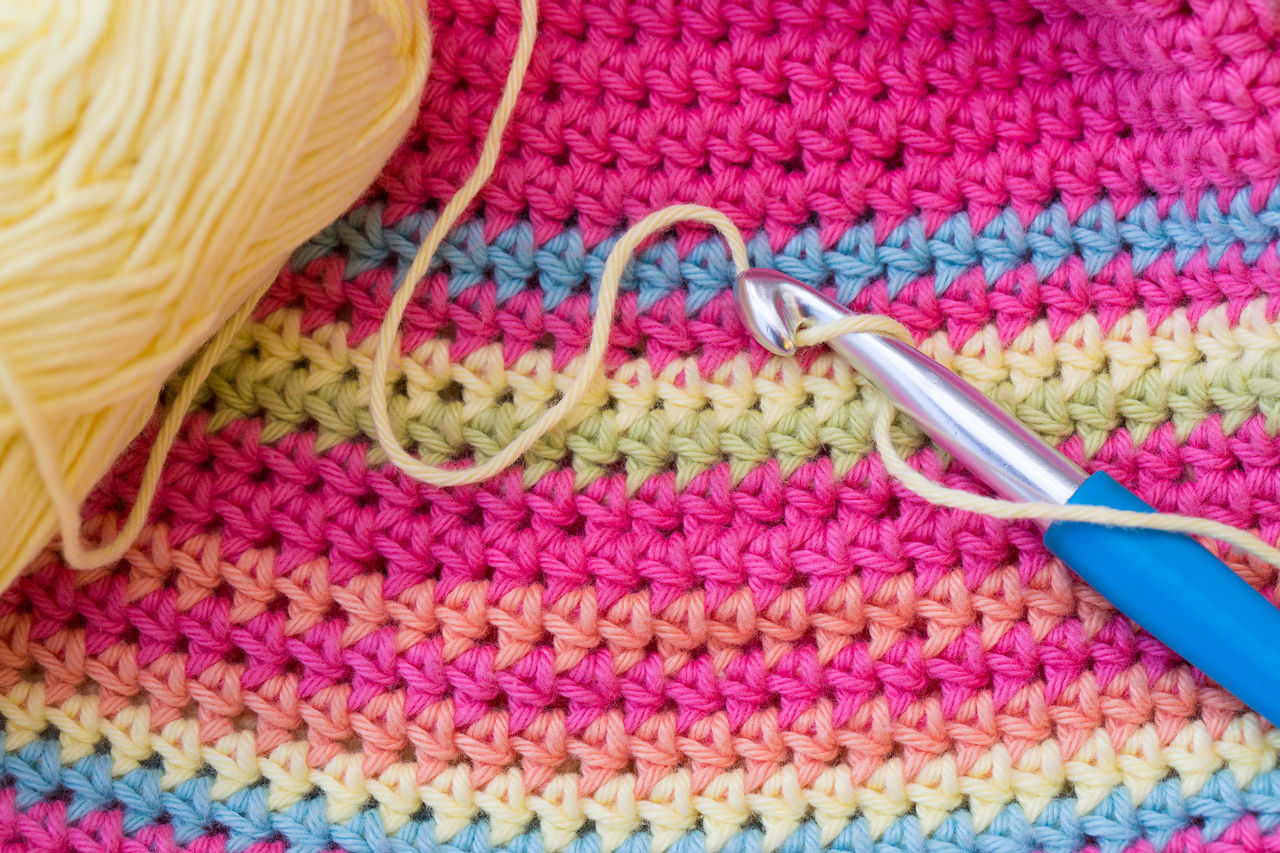 High angle view of crochet with wool