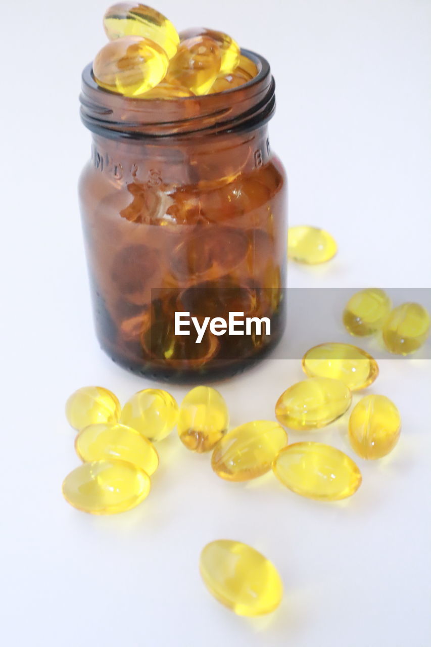 CLOSE-UP OF FRUITS IN JAR